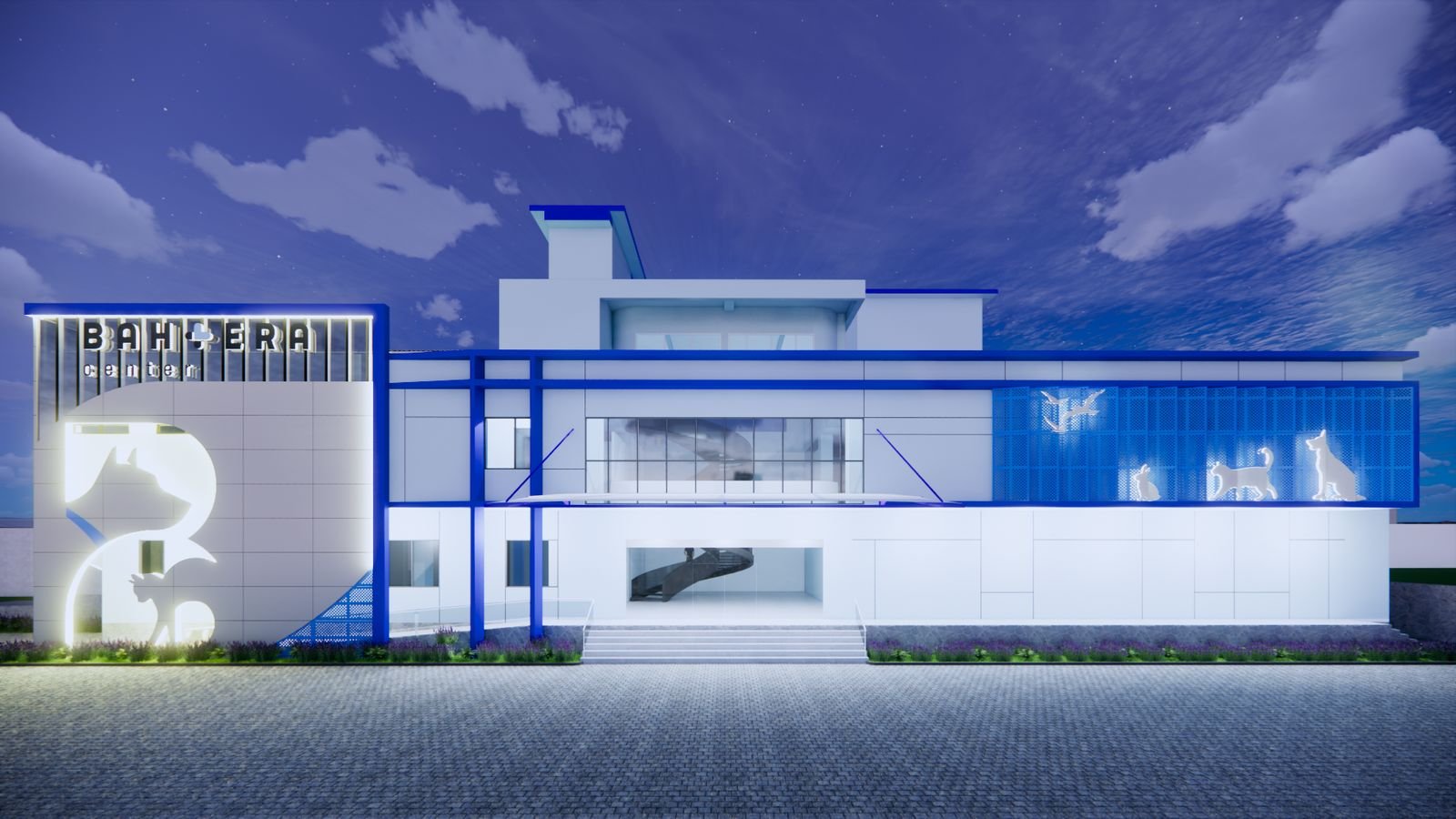 Bahtera Center front elevation lit at night
